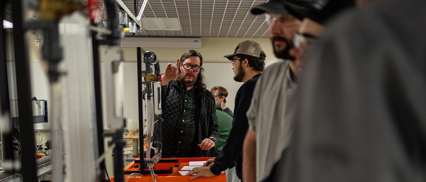 Dr. Green with engineering technology students in Thermal Fluids Lab